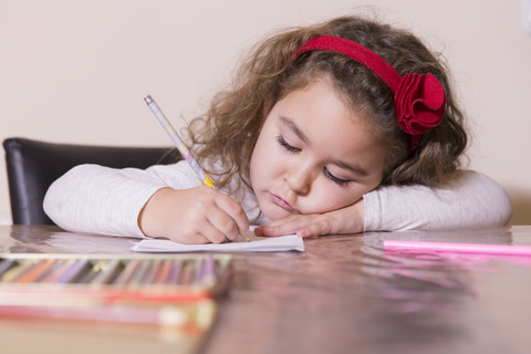 Portrait of drawing little girl stock photo