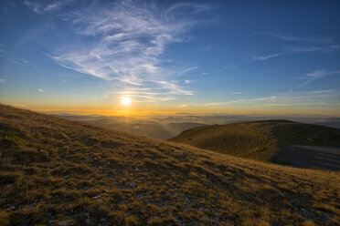 Italy, Umbria, Valsorda, Sunset over Apennines in autumn - LOMF000115