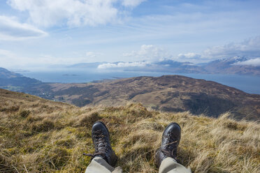 UK, Scotland, Scottish Highlands, Glencoe, resting hiker on top of a mountain - JBF000251