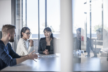 Group of young professionals having meeting in office - ZEF007526