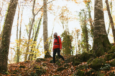 Spain, Catalunya, Girona, female hiker walking in the woods - EBSF001196