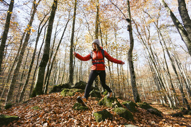 Spain, Catalunya, Girona, female hiker walking in the woods - EBSF001201