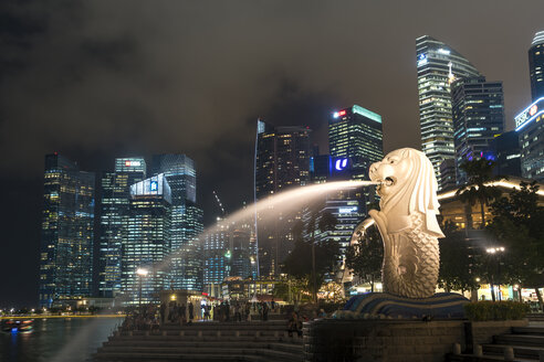 Singapore, view to skyscrapers with Merlion in the foreground at night - PC000211