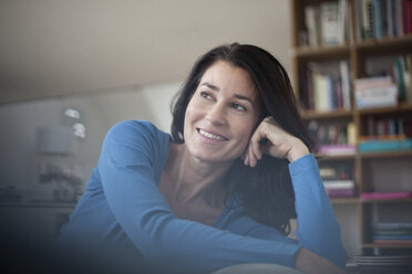 Smiling relaxed woman at home - RBF003656