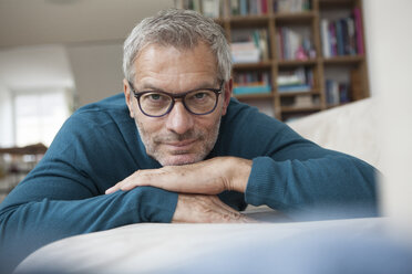 Portrait of mature man at home lying on couch - RBF003703