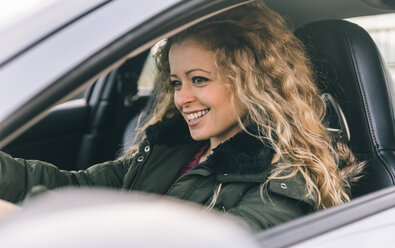 Woman driving her sports car - OIPF000047