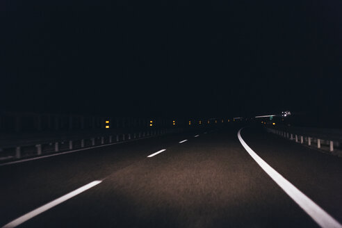 Italy, Udine, driving at night along the highway - MAUF000161