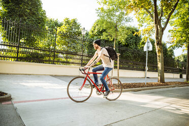 Young man with racing cycle in Vienna, Dr.-Karl-Renner-Ring - AIF000139