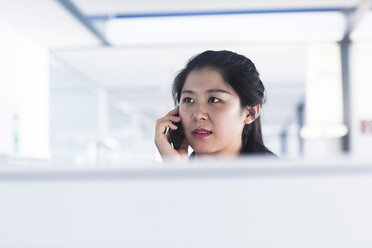 Chinese office worker working in corporate business - SGF001979