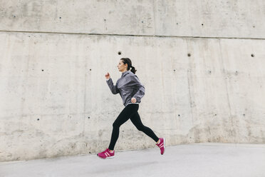 Spain, Barcelona, jogging woman - EBSF001208