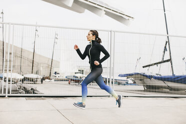 Spain, Barcelona, jogging woman - EBSF001219