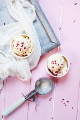 Two cups of vanilla icecream with dried raspberries - SBDF002625