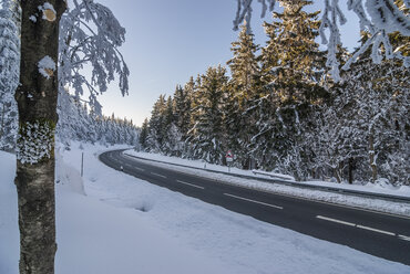 Germany, Saxony-Anhalt, Harz National Park, Country road in winter - PVCF000741