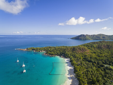 Seychelles, Praslin, Anse Lazio, beach and fishing net, Curieuse Island in the background, aerial view - FOF008372