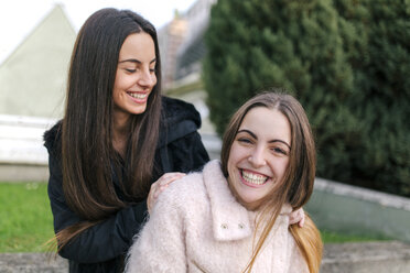 Portrait of two happy female friends - MGOF001269