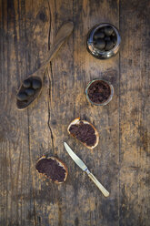 Black olives and slices of white bread with olive paste - LVF004403