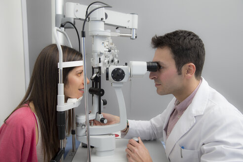 Woman at the optometrist making an eye test - ERLF000118