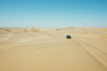 Namibia, Namib desert, Swakopmund, 4x4 car driving among the dunes in the desert - GEMF000640