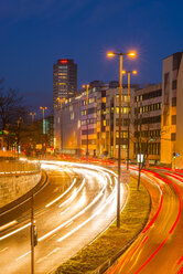 Germany, Cologne, Turiner Strasse in the evening, Ring Tower in the background - WGF000832