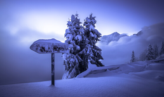 Germany, Bavaria, Berchtesgaden Alps, snowy landscape, sign on Rossfeld - STCF000153