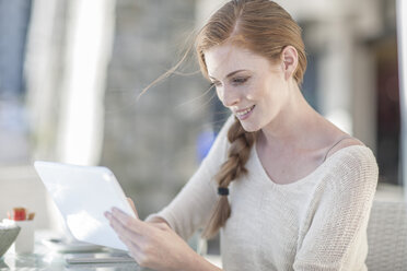 Young businesswoman using digital tablet - ZEF008278