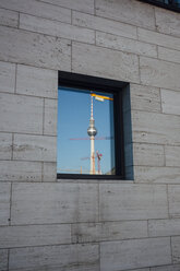 Germany, Berlin, Berlin TV Tower mirrored in window - ZMF000453