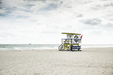 USA, Miami, view to attendant's tower on the empty beach at a stormy day - CHPF000220