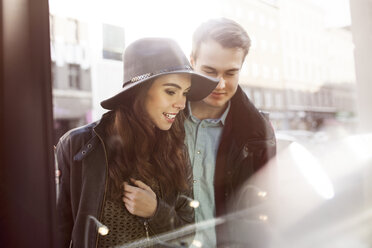 Young couple looking in shop window - GCF000131