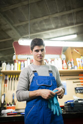 Portrait of a mechanic in his workshop - RAEF000835