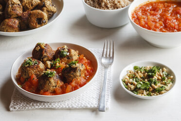 Plate of aubergine oat balls with tomato sauce - EVGF002788