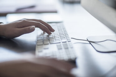 Close-up of woman working on computer - ZEF008331