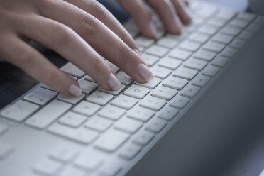 Close-up of woman working on computer - ZEF008339