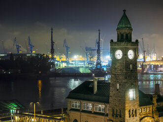 Germany, Hamburg, Port of Hamburg, St. Pauli Landing Stages, clock tower at night - KRPF001724