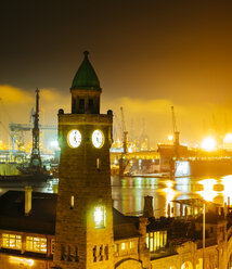 Germany, Hamburg, Port of Hamburg, St. Pauli Landing Stages, clock tower at night - KRPF001725