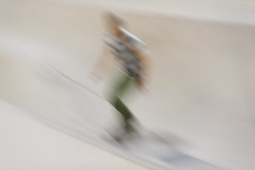 Blurred skateboarding man - SKCF000055