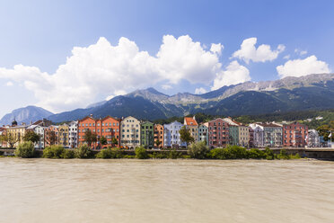 Austria, Tyrol, Innsbruck, colorful houses in front of Nordkette mountains, Inn river - WDF003515