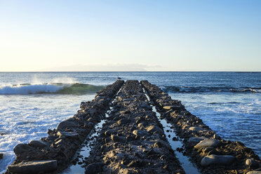 Spain, Canary Islands, Tenerife, view to the sea with pier in the foreground - SIPF000174