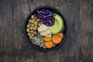Bowl of quinoa, avocado, roasted chick-peas, sweet potato, red cabbage and hummus - LVF004533