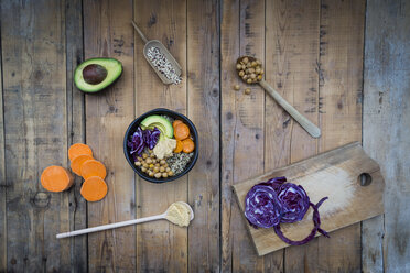 Bowl of quinoa, avocado, roasted chick-peas, sweet potato, red cabbage and hummus - LVF004536