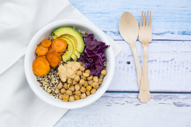 Bowl of quinoa, avocado, roasted chick-peas, sweet potato, red cabbage and hummus - LVF004538