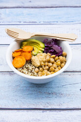 Bowl of quinoa, avocado, roasted chick-peas, sweet potato, red cabbage and hummus - LVF004539