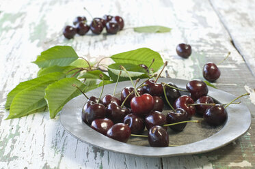 Cherries on metal plate - ASF005844