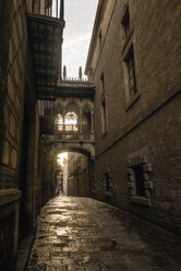 Spain, Barcelona, view to Bisbe Street in the Gothic Quarter - KIJF000178