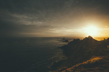 France, Brittany, Pointe du Raz, sunset at the coast with lighthouses Phare de la Vieille and Phare de Tevennec - MJF001801