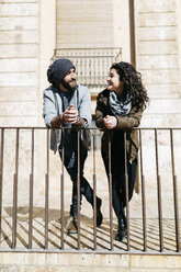 Spain, Tarragona, Young couple talking, City Break - JRFF000462