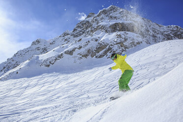 A snowboarder, snowboarding in Alps in Lech, Austria - VTF000512