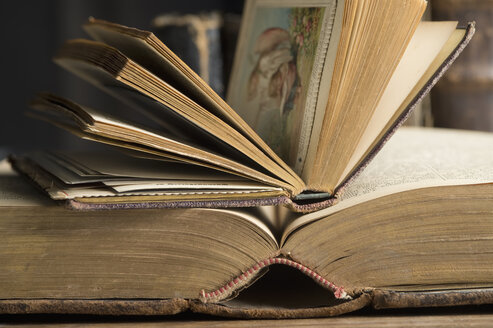 Two opened book in a historic library, close-up - CRF002739