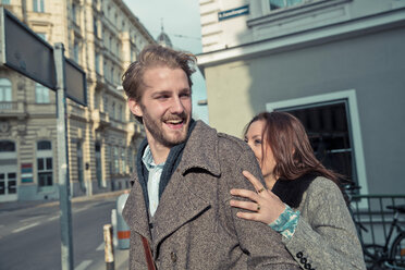 Happy young couple on the street - SUF000067