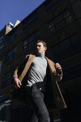 Young man in a hurry in the city - BOYF000112