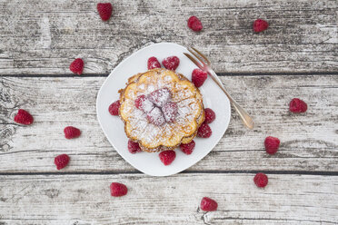 Stack of waffles with raspberries and icing sugar - LVF004601